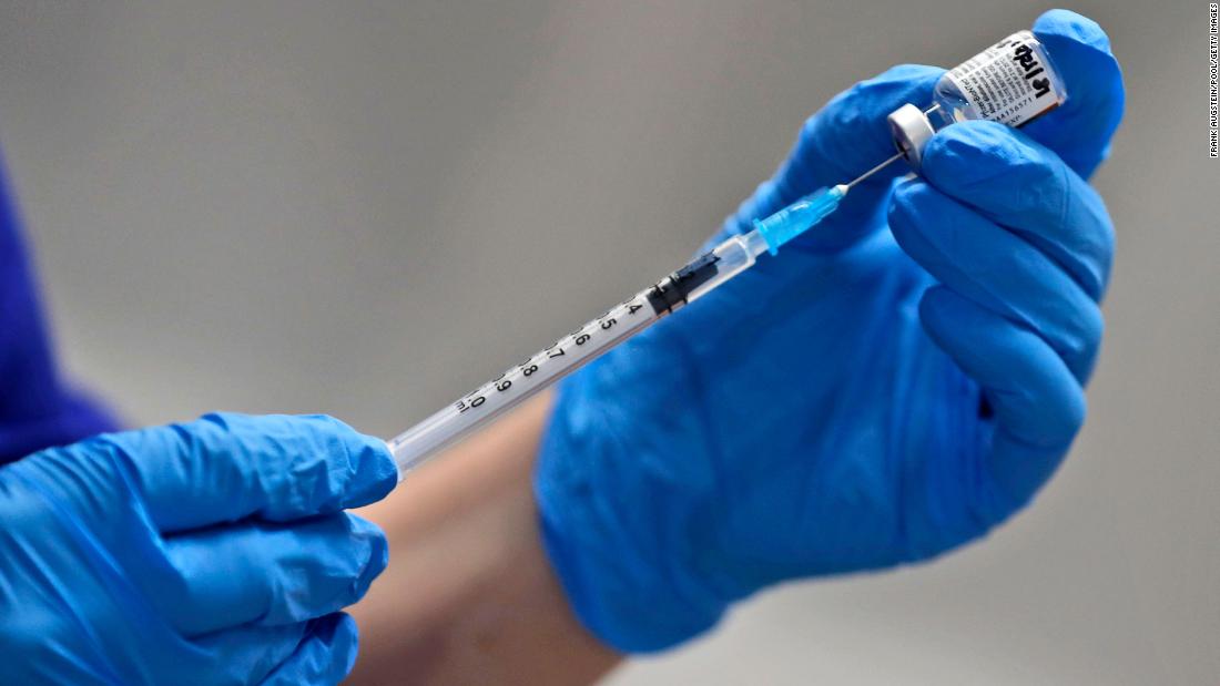 The UK’s top medical officials are defending the delay between Covid-19 vaccine doses