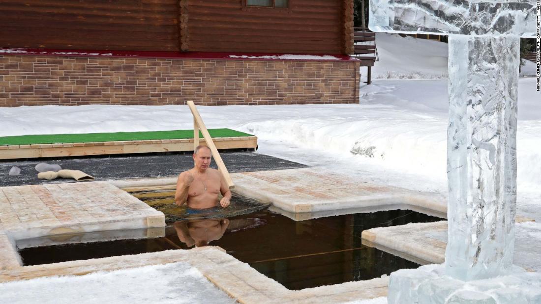 Russian President Vladimir Putin plunges into ice to celebrate Epiphany